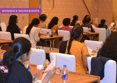 Women attendees at a corporate workshop